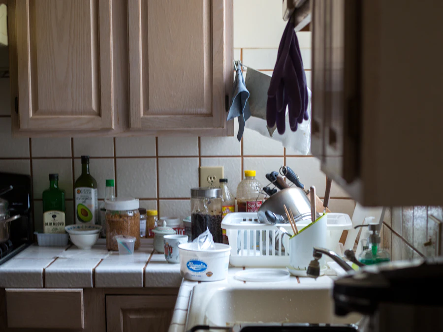 Before: a kitchen counter crowded with clutter and unwashed dishes